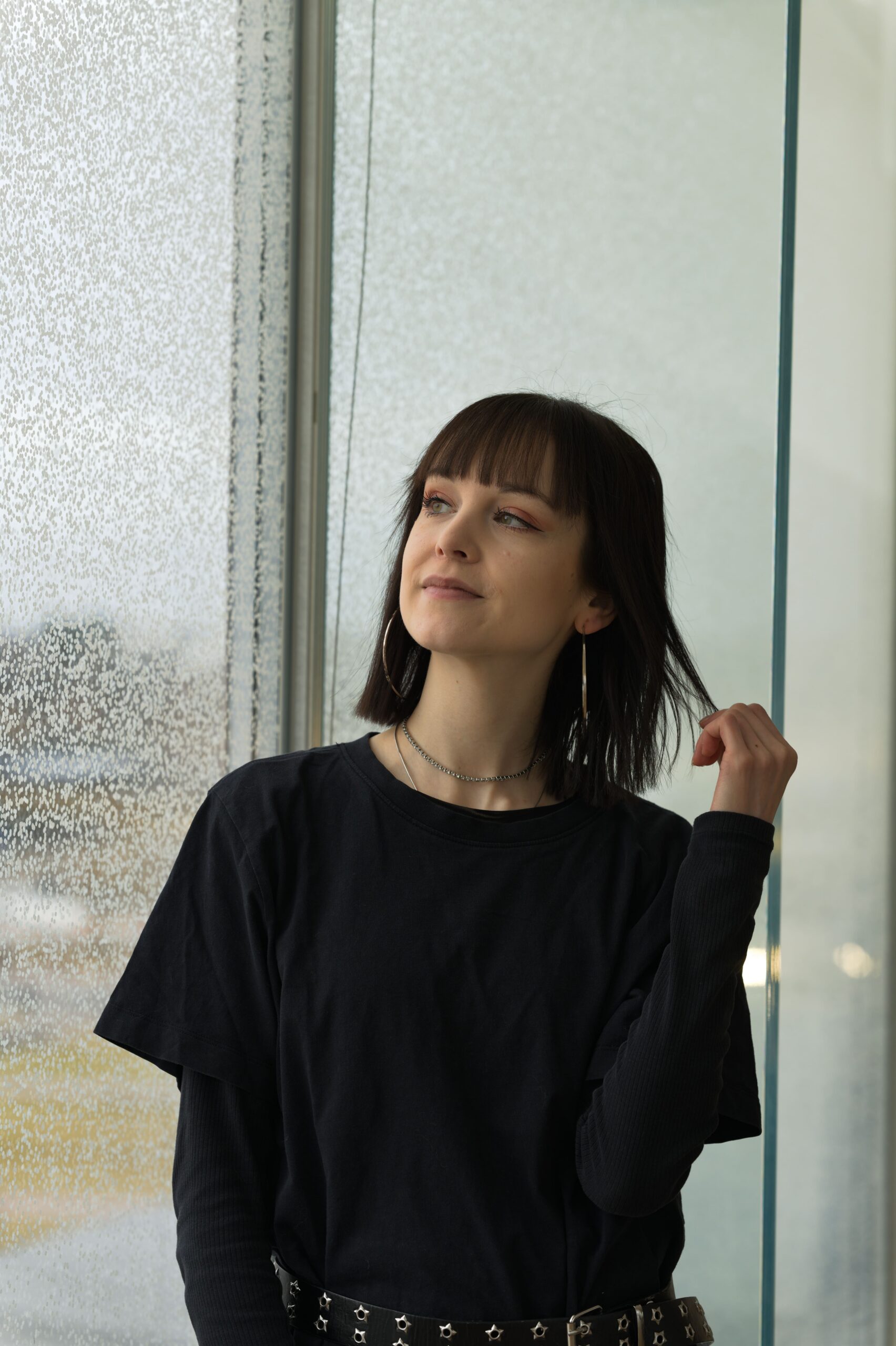 woman in front of a window