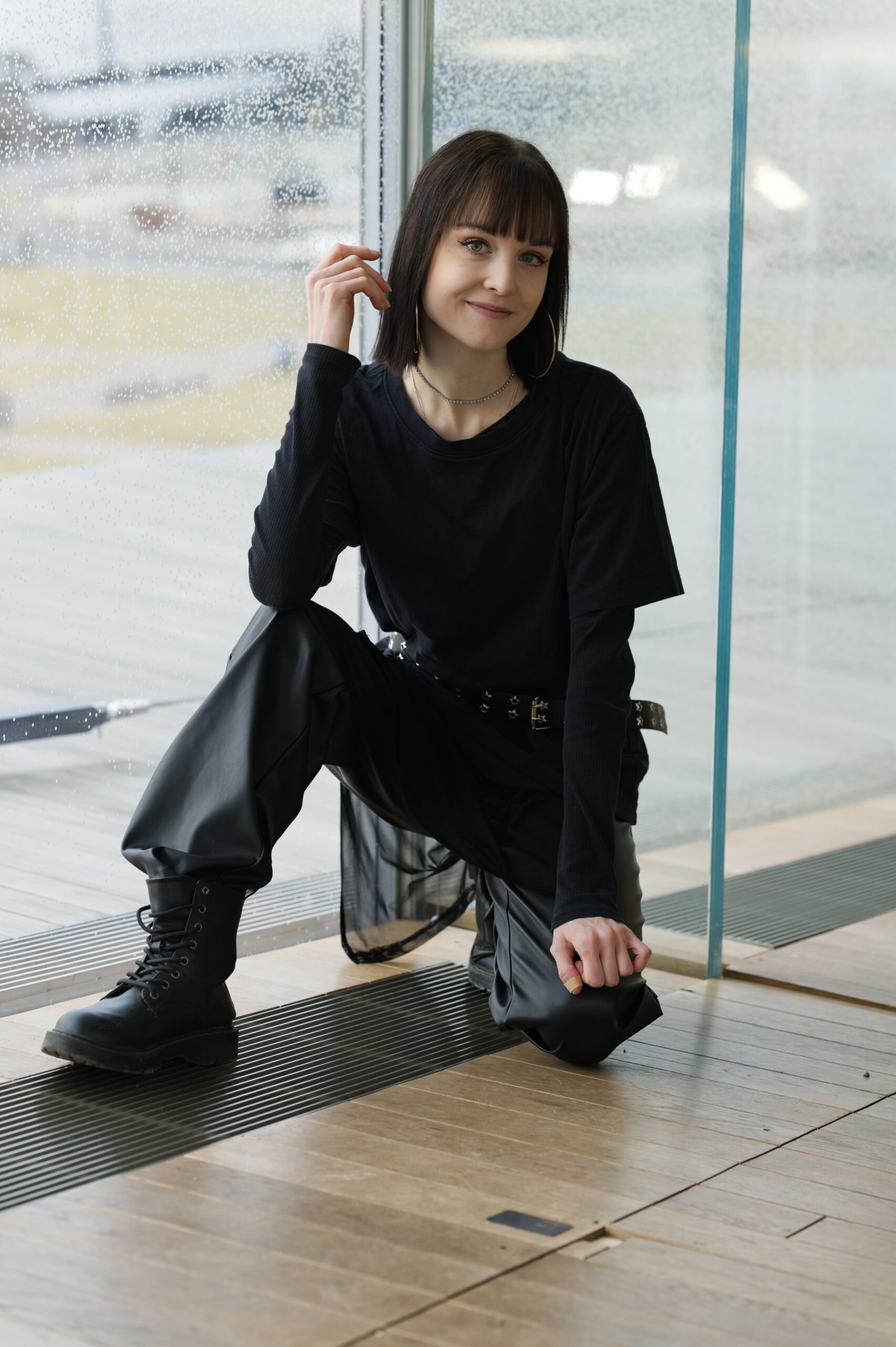 woman in front of a window