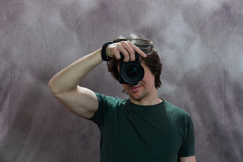 Photographer holding a camera