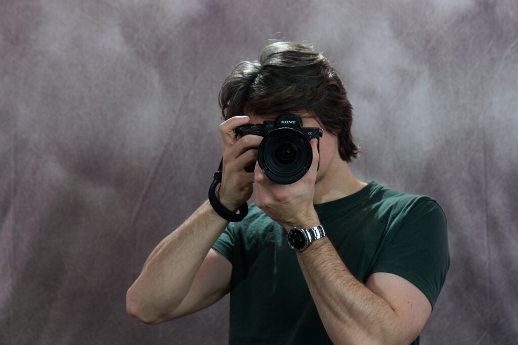 Photographer holding a camera